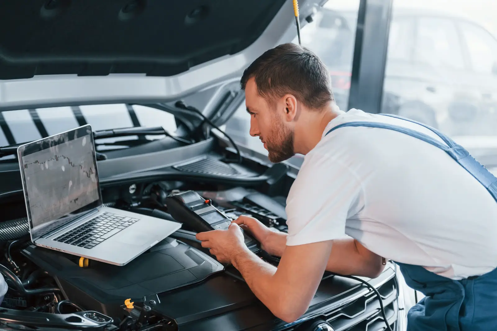 Mechanic building trust with a local vehicle owner