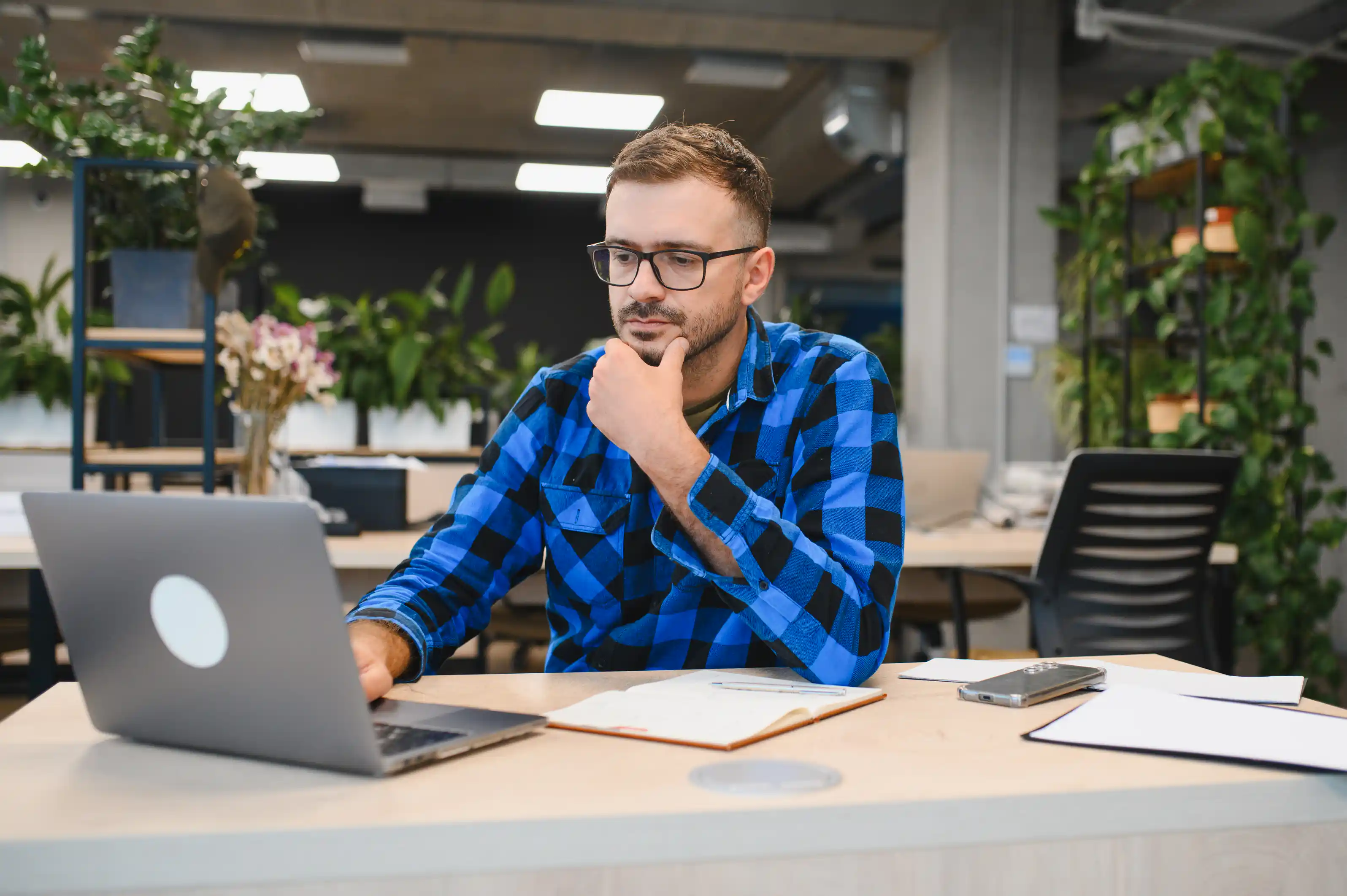 Small business owner working on digital marketing strategy