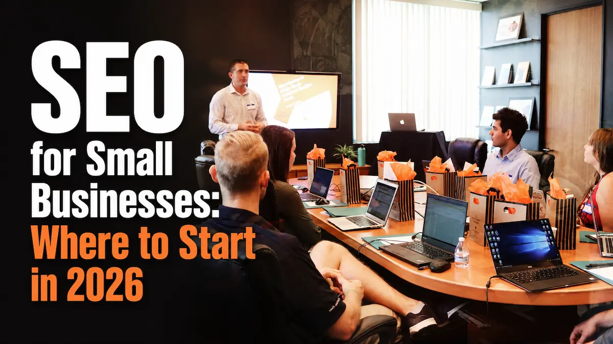 Small business owners reviewing marketing growth data on laptop